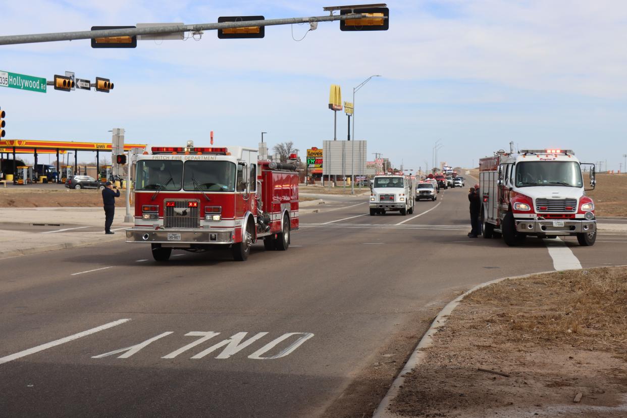 The body of Fritch Volunteer Fire Department Chief Zeb Smith is escorted through Amarillo Tuesday, as the convoy makes its way from Borger to Lubbock. Smith suffered a medical emergency and died while fighting a fire Tuesday, officials confirmed.