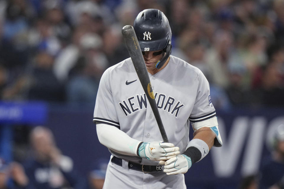 New York Yankees right fielder Aaron Judge repositions between pitches during the eighth inning of the team's baseball game against the Toronto Blue Jays on Thursday, Sept. 28, 2023, in Toronto. (Chris Young/The Canadian Press via AP)