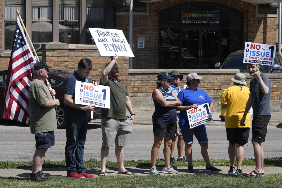 FILE - A small group of protestors gather during a "rosary rally" on Aug. 6, 2023, in Norwood, Ohio. Turnout is robust and misinformation rampant as Ohio concludes a hastily called and highly charged special election Tuesday, a contest that could determine the fate of abortion rights in the state and fuel political playbooks nationally heading into 2024. (AP Photo/Darron Cummings, File)