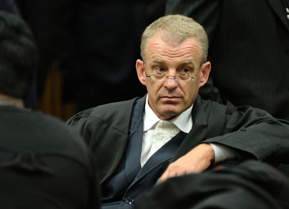 State prosecutor Gerrie Nel in the Oscar Pistorius case look on in court on the second day of Pistorius' trial at the high court in Pretoria, South Africa, Tuesday, March 4, 2014. Pistorius is charged with murder for the shooting death of his girlfriend, Reeva Steenkamp, on Valentines Day in 2013. (AP Photo/Antoine de Ras, Pool)