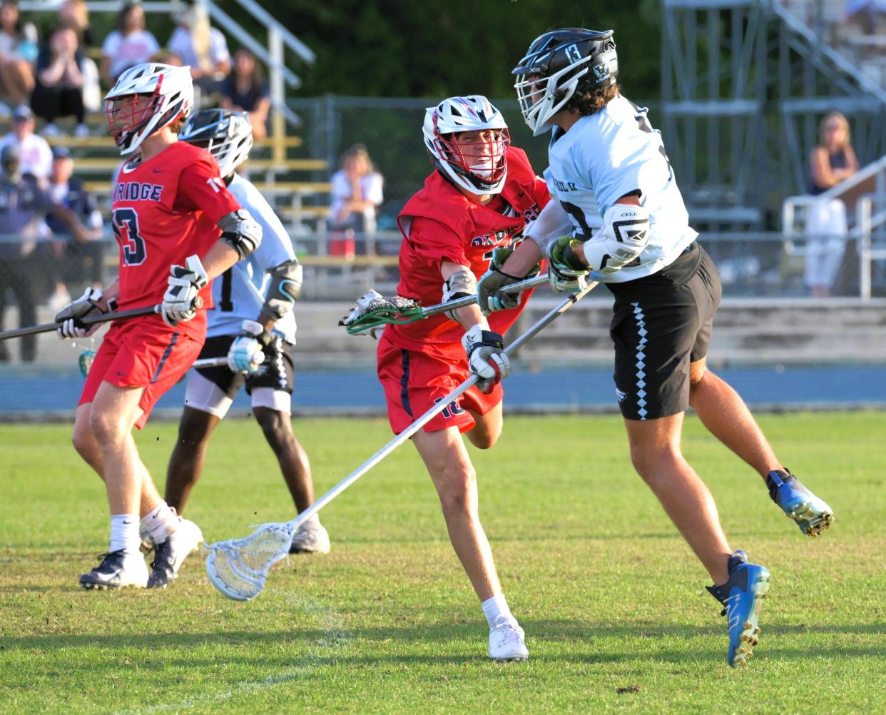 St. John Paul II's Michael Evans unleashes a shot on goal during the second half of Tuesday's district final against Oxbridge Academy on April 16, 2024.