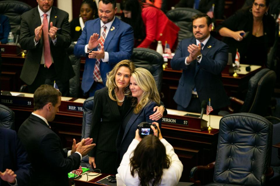 Rep. Jennifer Canady, left, hugs Rep. Jenna Persons-Mulicka after the House passed SB 300, which bans abortions after six weeks in Florida, on Thursday, April 13, 2023. 