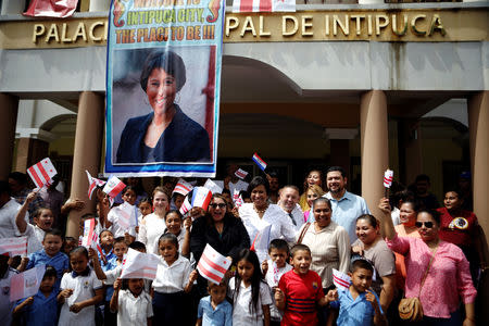 Washington D.C. mayor Muriel Bowser poses for a picture with students during her visit to Intipuca, El Salvador, August 14, 2018. REUTERS/Jose Cabezas