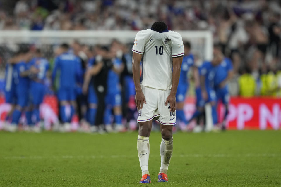 England's Jude Bellingham reacts at the end of a Group C match against Slovenia at the Euro 2024 soccer tournament in Cologne, Germany, Tuesday, June 25, 2024. The match ended in a 0-0 draw. (AP Photo/Martin Meissner)