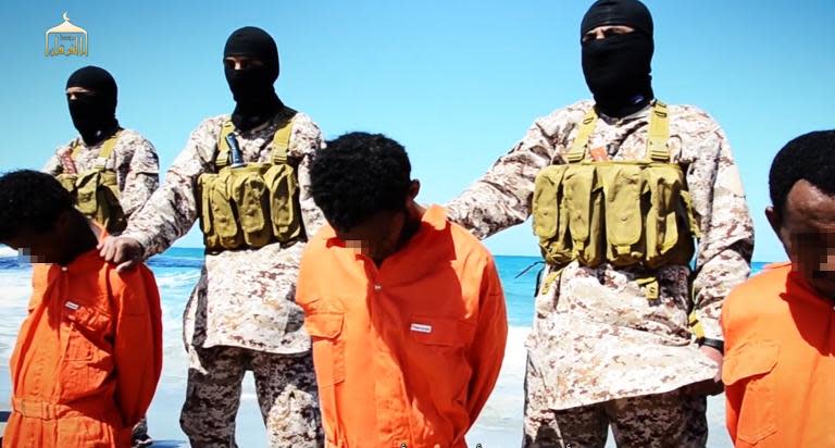 A video posted online purportedly shows men described as Ethiopian Christians about to be beheaded by an Islamic State affiliate at an undisclosed location in Libya