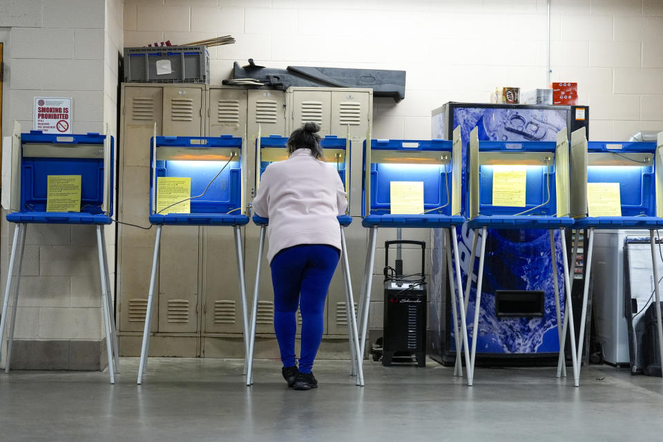 A voter casts her ballot during the Spring election Tuesday, April 2, 2024, in Milwaukee, Wis. (AP Photo/Morry Gash)