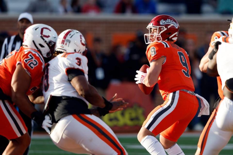 National quarterback Jake Haener, of Fresno State (9), throws a pass during the second half of the Senior Bowl NCAA college football game, Saturday, Feb. 4, 2023, in Mobile, Ala.. (AP Photo/Butch Dill)