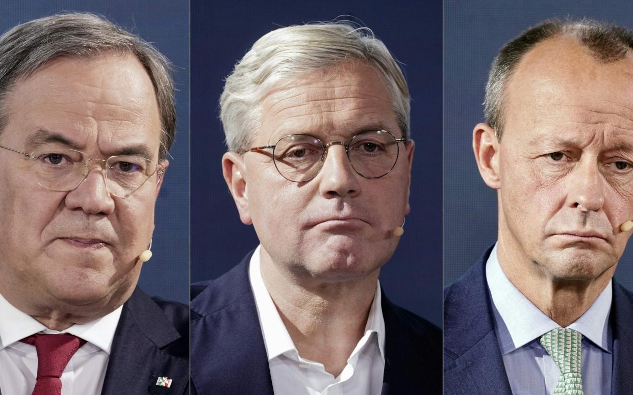 The three candidates for the leadership of the Christian Democratic Union party: From left to right, Armin Laschet, Norbert Röttgen and Friedrich Merz - MICHAEL KAPPELER/AFP via Getty Images