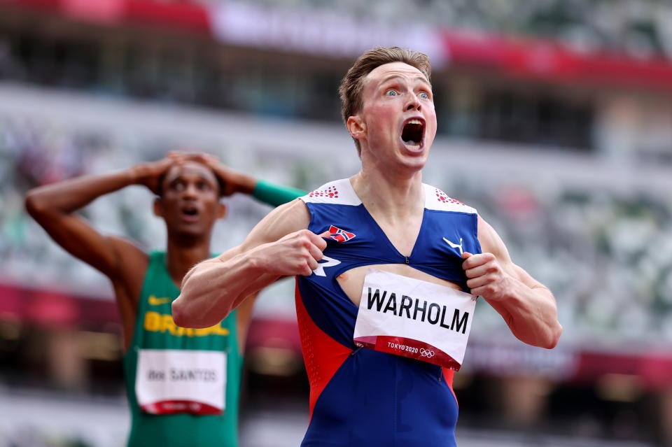 Tokyo 2020 Olympics - Athletics - Men's 400m Hurdles - Final - Olympic Stadium, Tokyo, Japan - August 3, 2021. Karsten Warholm of Norway reacts after crossing the line to win gold REUTERS/Lucy Nicholson     TPX IMAGES OF THE DAY