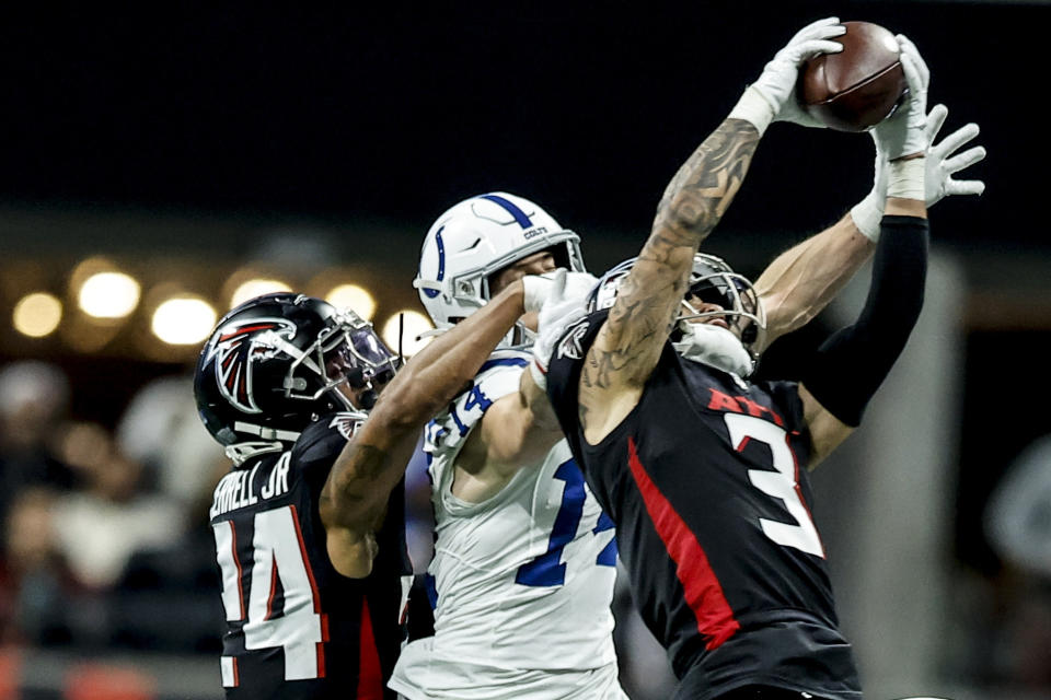 Atlanta Falcons safety Jessie Bates III (3) intercepts the ball against Indianapolis Colts wide receiver Alec Pierce (14) during the second half of an NFL football game, Sunday, Dec. 24, 2023, in Atlanta. (AP Photo/Alex Slitz)