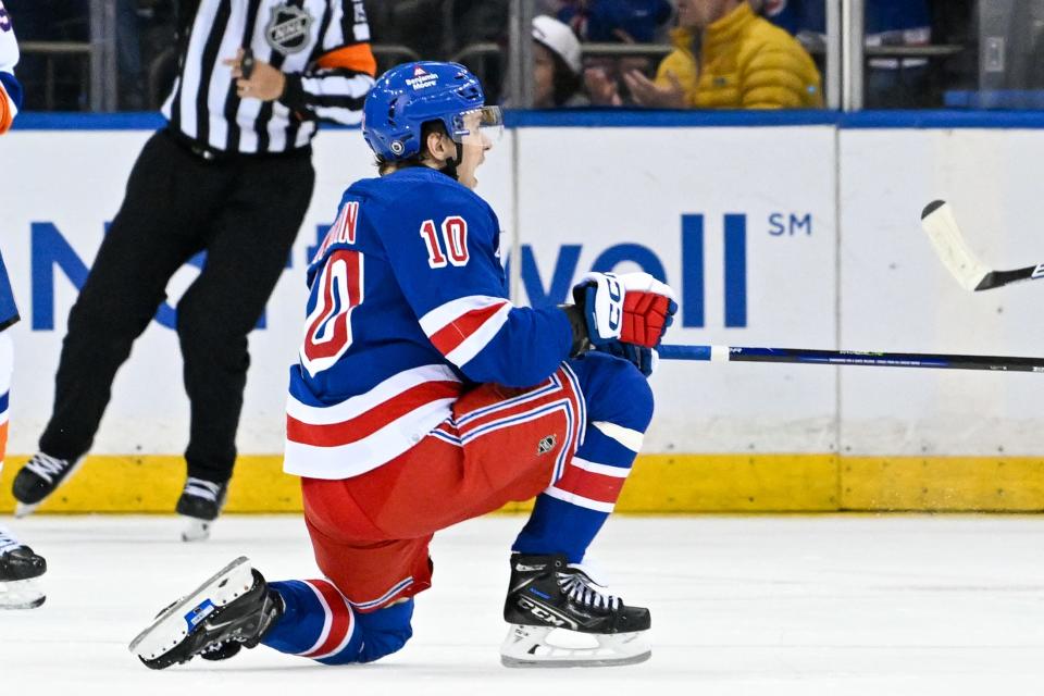 Apr 13, 2024; New York, New York, USA; New York Rangers left wing Artemi Panarin (10) celebrates his goal against the New York Islanders during the third period at Madison Square Garden.