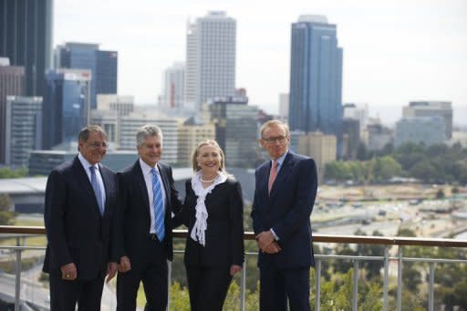 Australian Foreign Minister Bob Carr (R) and Australian Minister of Defense Stephen Smith (2nd L) pose for a photo with US Secretary of State Hillary Clinton (2nd R) and US Secretary of Defense Leon Panetta prior to meetings as part of AUSMIN at the State Reception Center in Kings Park in Perth, on November 14