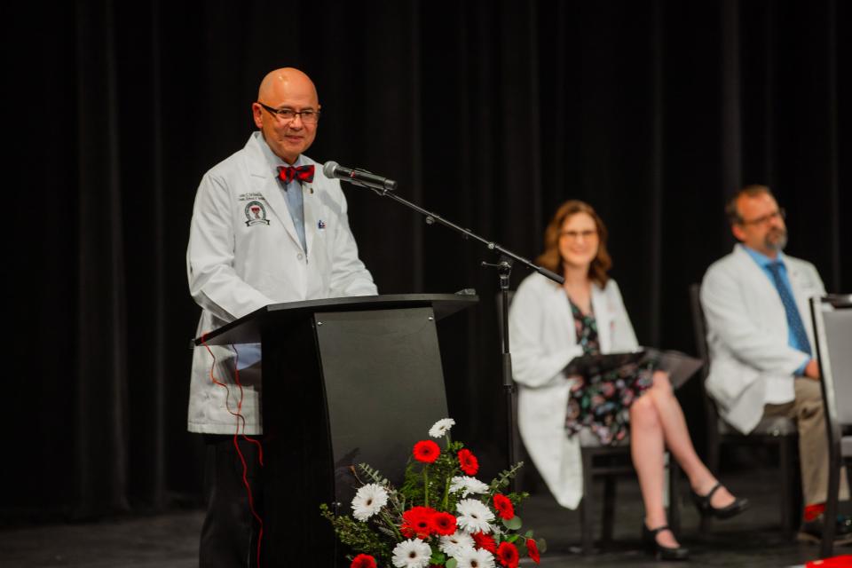 Texas Tech University Health Sciences Center School of Medicine Dean John DeToledo, M.D., speaks at the White Coat Ceremony for the Class of 2028, held Friday at the Buddy Holly Hall of Performing Arts and Sciences.