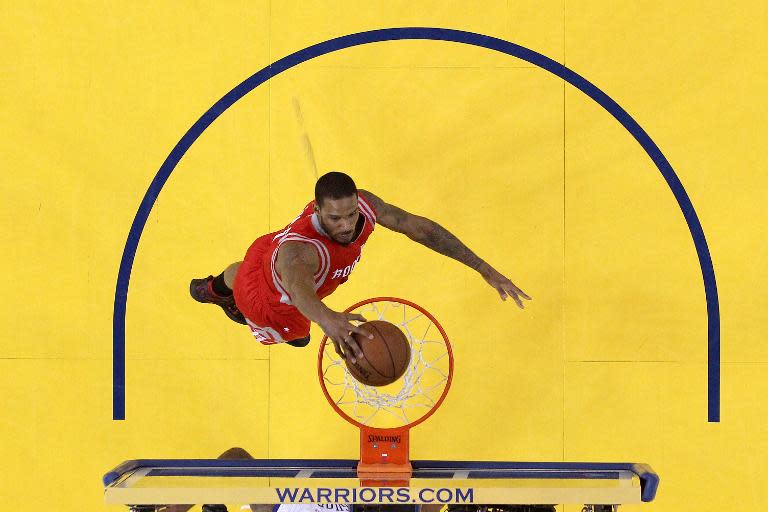 Trevor Ariza of the Houston Rockets dunks against the Golden State Warriors during game two of the Western Conference Finals of the 2015 NBA PLayoffs at ORACLE Arena on May 21, 2015 in Oakland, California