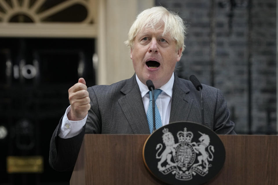 FILE - Outgoing British Prime Minister Boris Johnson speaks outside Downing Street in London, Tuesday, Sept. 6, 2022 before heading to Balmoral in Scotland, where he will announce his resignation to Britain's Queen Elizabeth II. Former U.K. Prime Minister Johnson says he’s quitting as a lawmaker after being told he will be sanctioned for misleading Parliament. Johnson quit on Friday, June 9, 2023 after receiving the results of an investigation by lawmakers over misleading statements he made to Parliament about a slew of gatherings in government that breached pandemic lockdown rules. (AP Photo/Kirsty Wigglesworth, File)