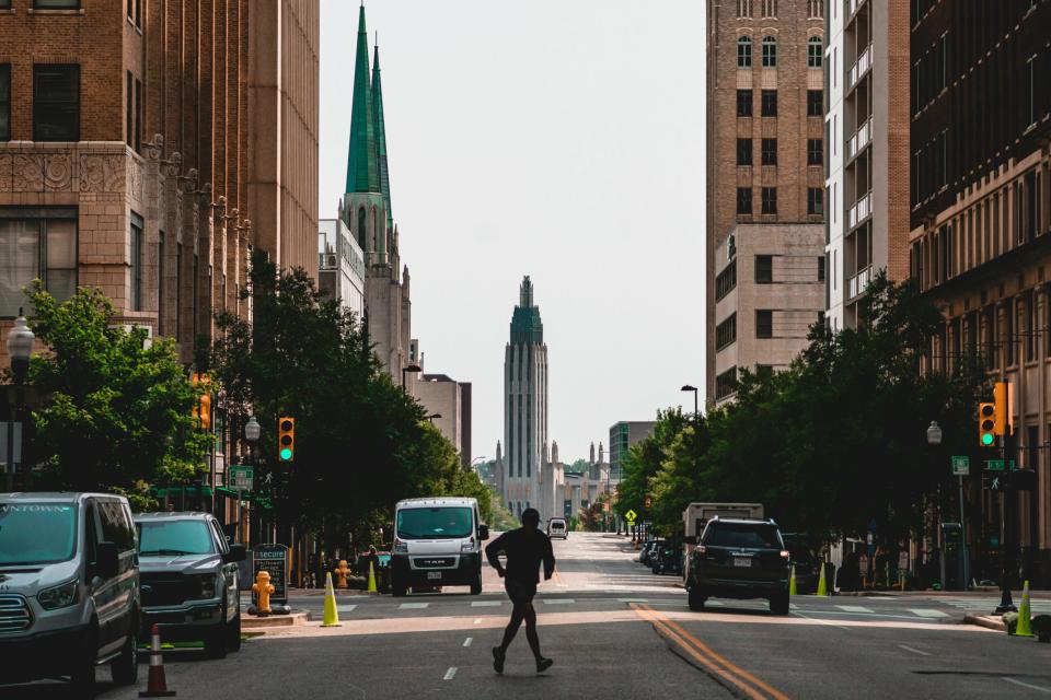 Tulsa is a popular travel destination in Oklahoma. 
pictured: a busy street of downtown Tulsa