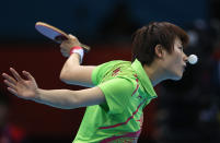 Ning Ding of China competes during her Women's Singles Table Tennis Gold Medal match against Xiaoxia Li of China on Day 5 of the London 2012 Olympic Games at ExCeL on August 1, 2012 in London, England. (Photo by Feng Li/Getty Images) <br><br> <b>Related:</b> <a href="http://yhoo.it/Od80ps" rel="nofollow noopener" target="_blank" data-ylk="slk:Intense Faces of Table Tennis;elm:context_link;itc:0;sec:content-canvas" class="link ">Intense Faces of Table Tennis</a>