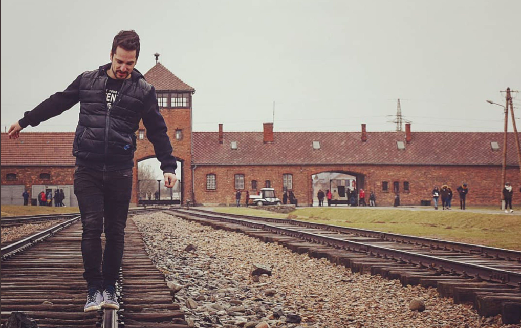 Auschwitz memorial and museum has issued a statement on Twitter asking visitors to stop playfully posing on train tracks. (Photo: Twitter)