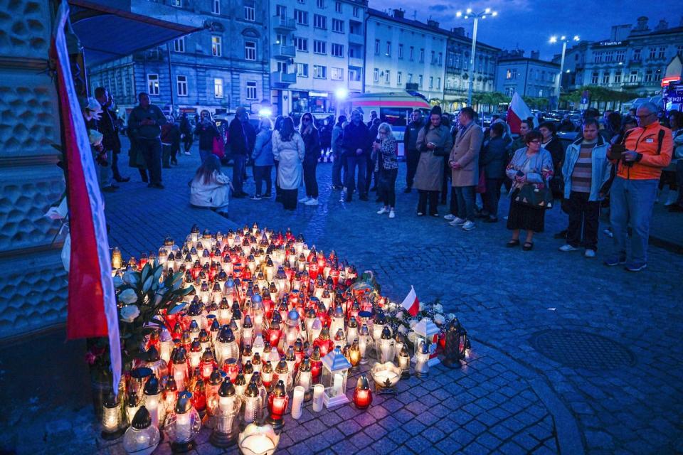 Friends and residents gather to place candles and flowers in honor of Damian Soból, a Polish food aid worker who was killed with six other World Central Kirchen workers by Israeli airstrike in Gaza this week, in Soból's hometown of Przemysl, in southeastern Poland, on Thursday, April 4, 2024. World Central Kitchen and a few other aid groups suspended operations in Gaza, after seven aid workers were killed by airstrikes. Yet despite the danger, many of the largest organizations barely slowed down. Hunger has become commonplace in Gaza amid the war with Israel, and U.N. officials warn that famine is increasingly likely in northern Gaza.