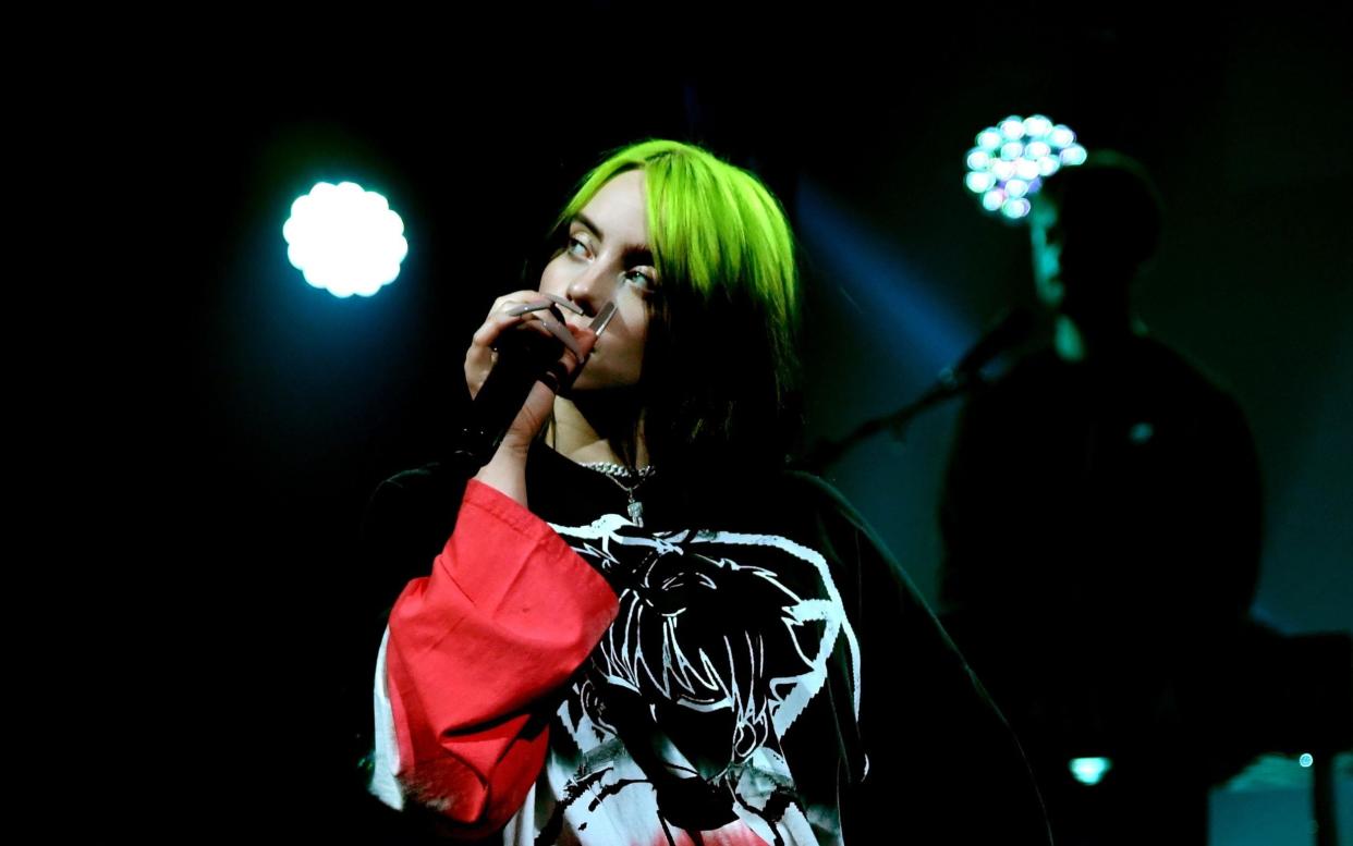 Billie Eilish on stage at The Forum in Los Angeles last night - Getty