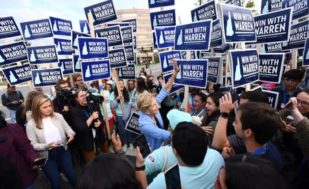 Democratic 2020 U.S. presidential candidate and U.S. Senator Elizabeth Warren (D-MA) greets supporters at the New Hampshire Democratic Party state convention in Manchester