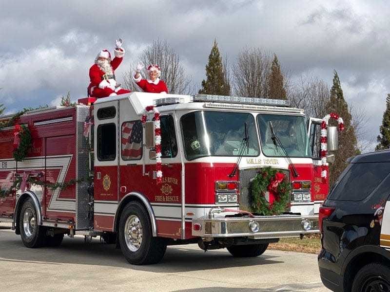 Santa and Mrs. Claus toured the town of Mills River Saturday, Dec. 11, 2021 with the help of Mills River Fire & Rescue and the Henderson County Sheriff's Office.