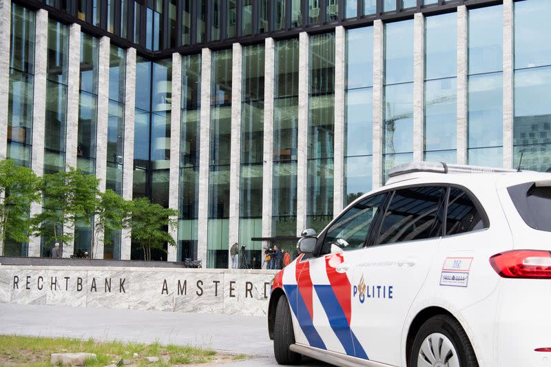 Two men go on trial for the murder of Dutch celebrity crime reporter, in Amsterdam