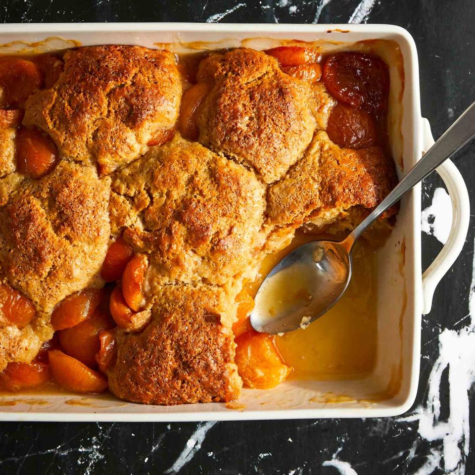 <p>This pretty apricot cobbler features tender biscuits that top sweet, jammy apricots sweetened with honey and flavored with ginger. It's a great dessert that makes the most of the early-summer stone fruit season. <a href="https://www.eatingwell.com/recipe/7960038/apricot-cobbler/" rel="nofollow noopener" target="_blank" data-ylk="slk:View Recipe;elm:context_link;itc:0;sec:content-canvas" class="link ">View Recipe</a></p>