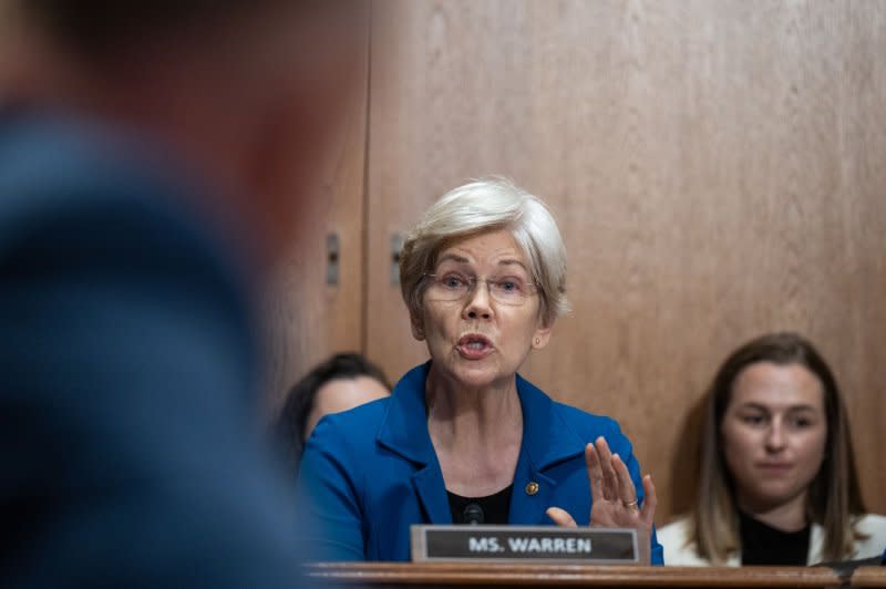 Sen. Elizabeth Warren, D-Mass., described UnitedHealth Group as a "monopoly on steroids" and asked if it's under federal investigation for allegedly cheating taxpayers out of $3.7 billion in 2017 through illegal billing for medical services paid by taxpayers, which Witty declined to answer. Photo by Annabelle Gordon/UPI