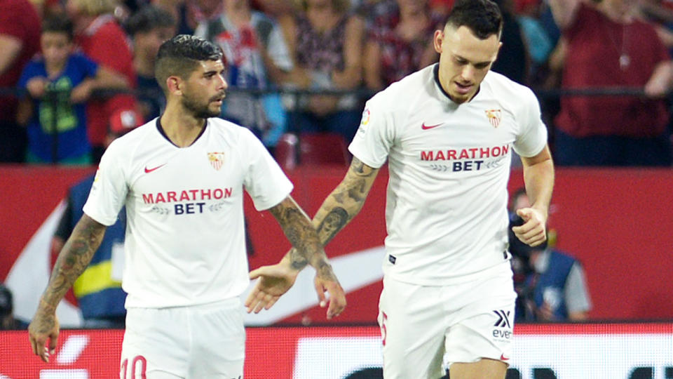 Ever Banega and Lucas Ocampos, pictured here in action for Sevilla in 2019.