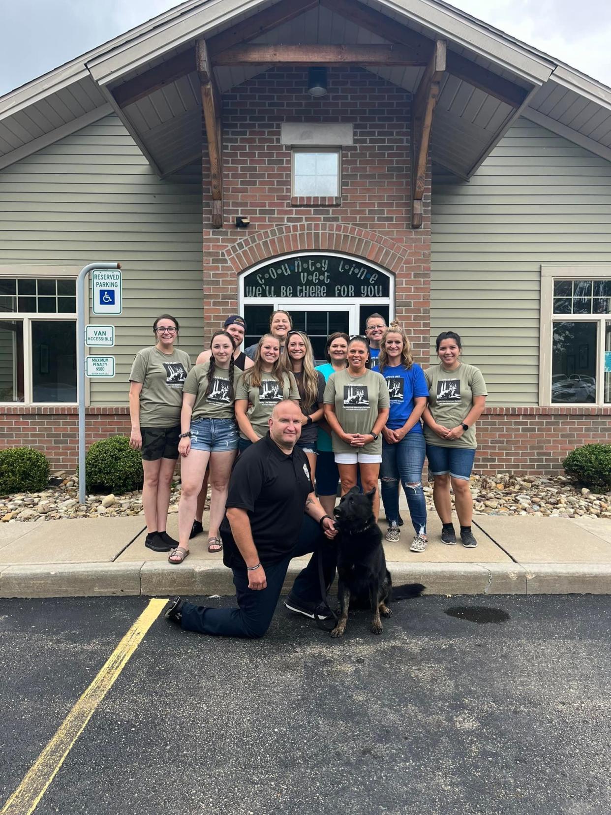 County Line Veterinary Services in Homeworth celebrated its 30th anniversary with an open house on Saturday, July 19, 2022. On hand for the event was Alliance Police Officer Anthony Palozzi and the department's newest K9 officer, Xander.