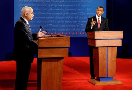 U.S. Republican presidential candidate John McCain (L) and U.S. Democratic presidential candidate Barack Obama (R) take part in their first 2008 U.S. presidential debate at the University of Mississippi in Oxford, Mississippi, U.S., September 26, 2008. REUTERS/Jim Bourg/Files