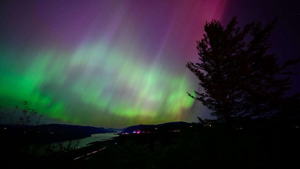 <div>The Northern Lights are seen above the Columbia River Gorge from Chanticleer Point Lookout in the early morning hours of May 11, 2024 in Latourell, Oregon. Places as far south as Alabama and parts of Northern California were expected to see the aurora borealis, also known as the northern lights from a powerful geomagnetic storm that reached Earth. (Photo by Mathieu Lewis-Rolland/Getty Images)</div>