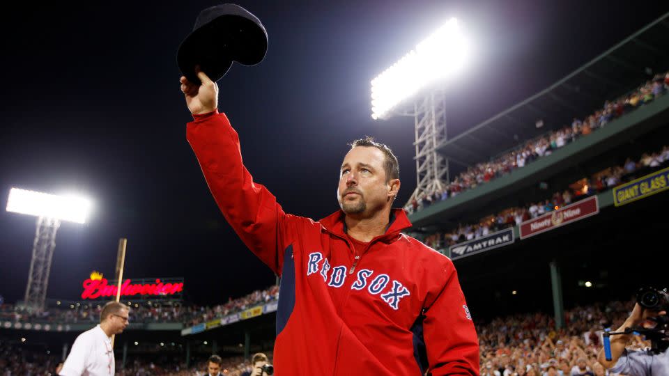Red Sox pitcher Tim Wakefield waves to the crowd after his 200th (and final) career win in September 2011.  - Yoon S. Byun/The Boston Globe/Getty Images