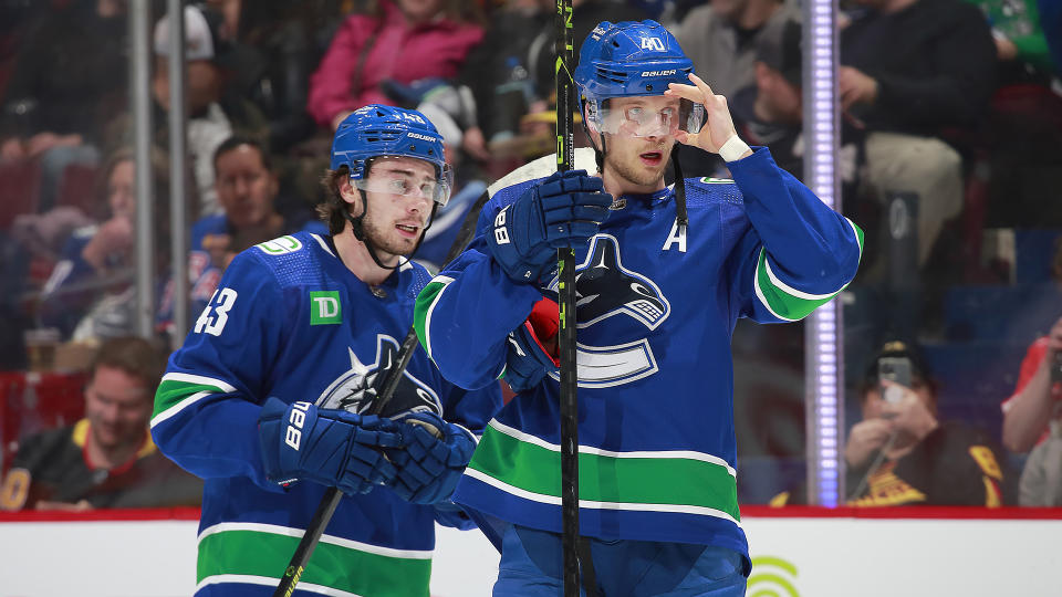 Quinn Hughes #43 and Elias Pettersson #40 are the cornerstones of the Canucks. (Photo by Jeff Vinnick/NHLI via Getty Images)