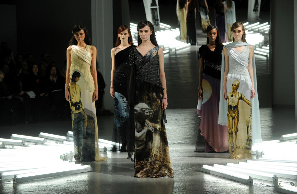 The Rodarte Fall 2014 collection is modeled during Fashion Week in New York, Tuesday, Feb. 11, 2014. (AP Photo/Diane Bondareff)