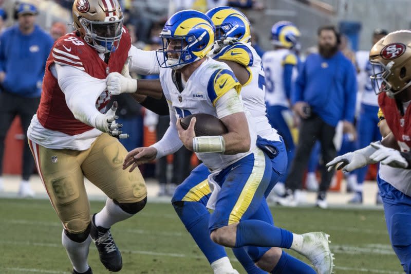 Backup quarterback Carson Wentz (C) threw two touchdown passes and an interception last season for the Los Angeles Rams. File Photo by Terry Schmitt/UPI