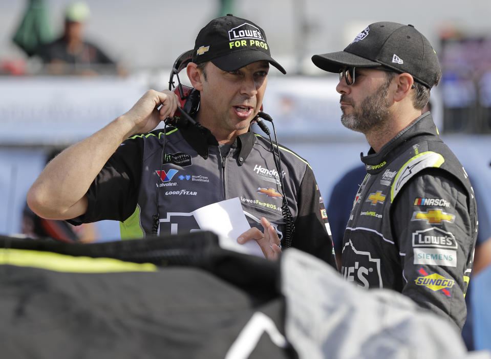 Crew chief Chad Knaus and Jimmie Johnson have been together for Johnson’s entire Cup Series career. (AP Photo/Chuck Burton