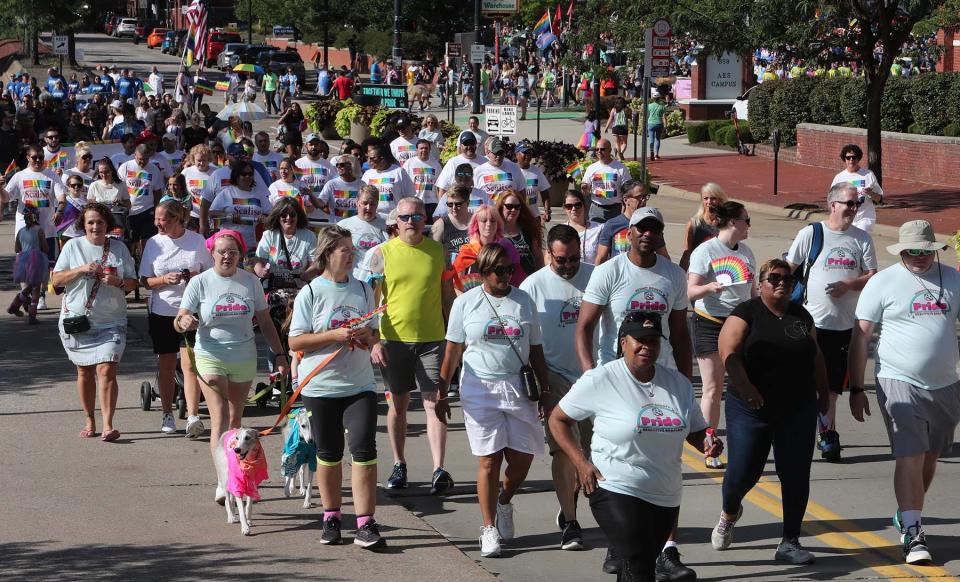 Hundreds participate in the Akron Equity March along South Main Street during Saturday's festival.