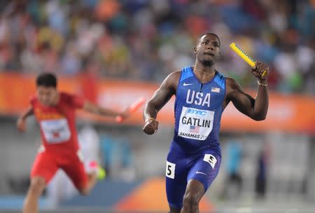 Apr 22, 2017; Nassau, Bahamas; Justin Gatlin runs the anchor leg on the United States 4 x 100m relay that won in 38.43 during the IAAF World Relays at Thomas A. Robinson Stadium. Mandatory Credit: Kirby Lee-USA TODAY Sports