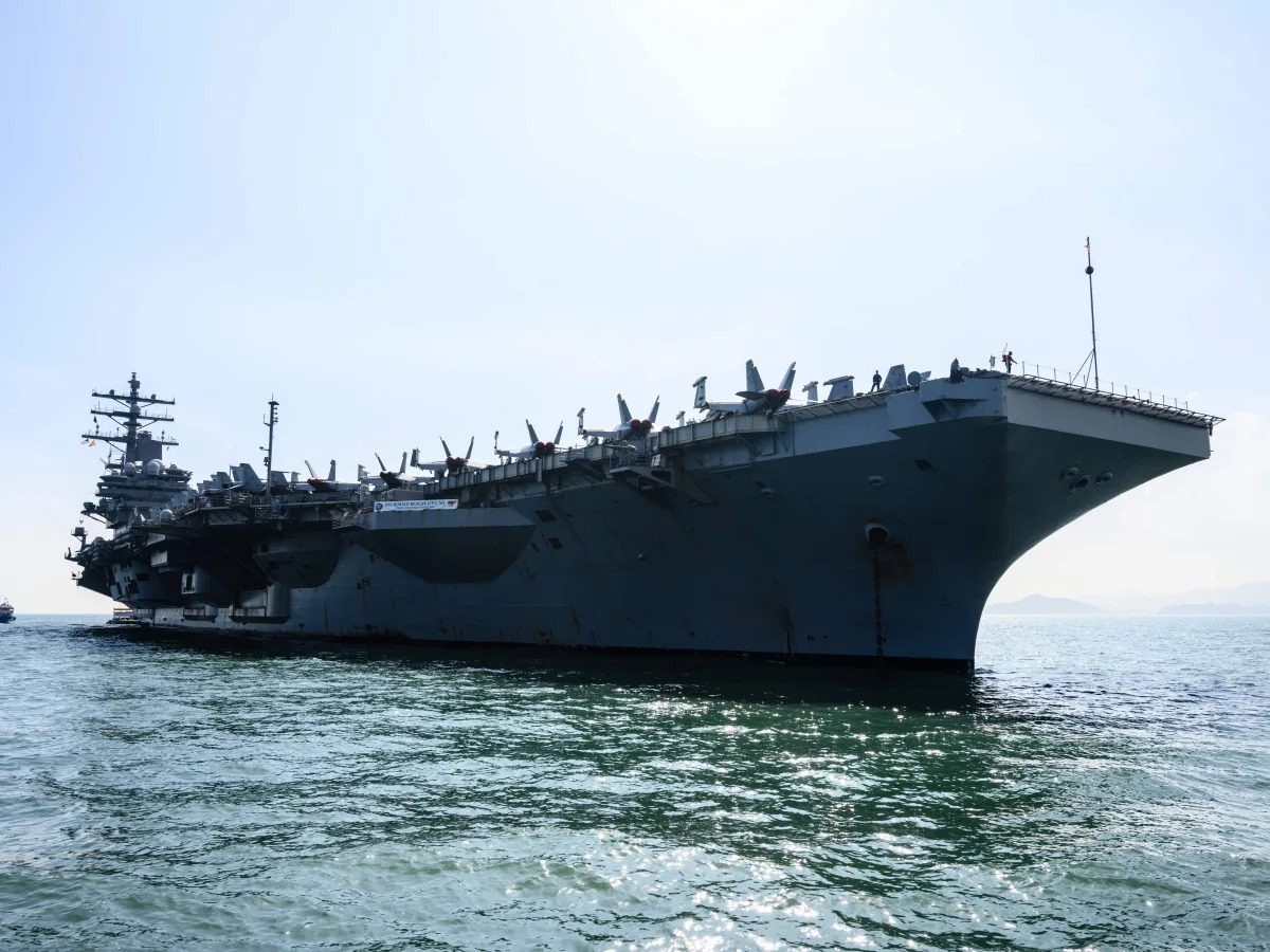 A US aircraft carrier and its strike group are headed into the hotly contested w..