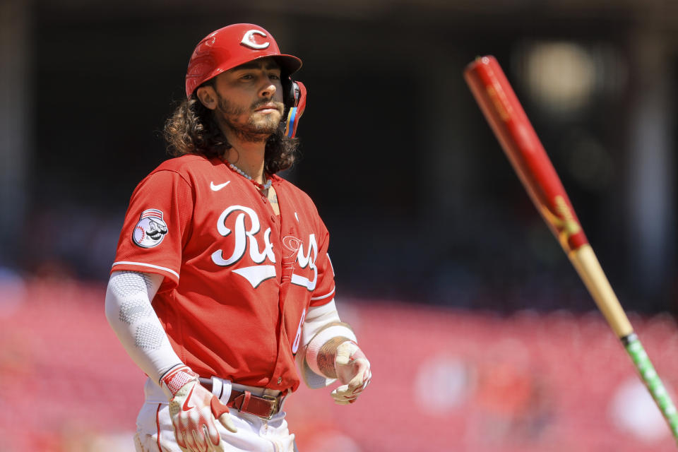 Cincinnati Reds' Jonathan India tosses his bat after he draws a walk during the fifth inning of a baseball game against the Tampa Bay Rays in Cincinnati, Wednesday, April 19, 2023. (AP Photo/Aaron Doster)