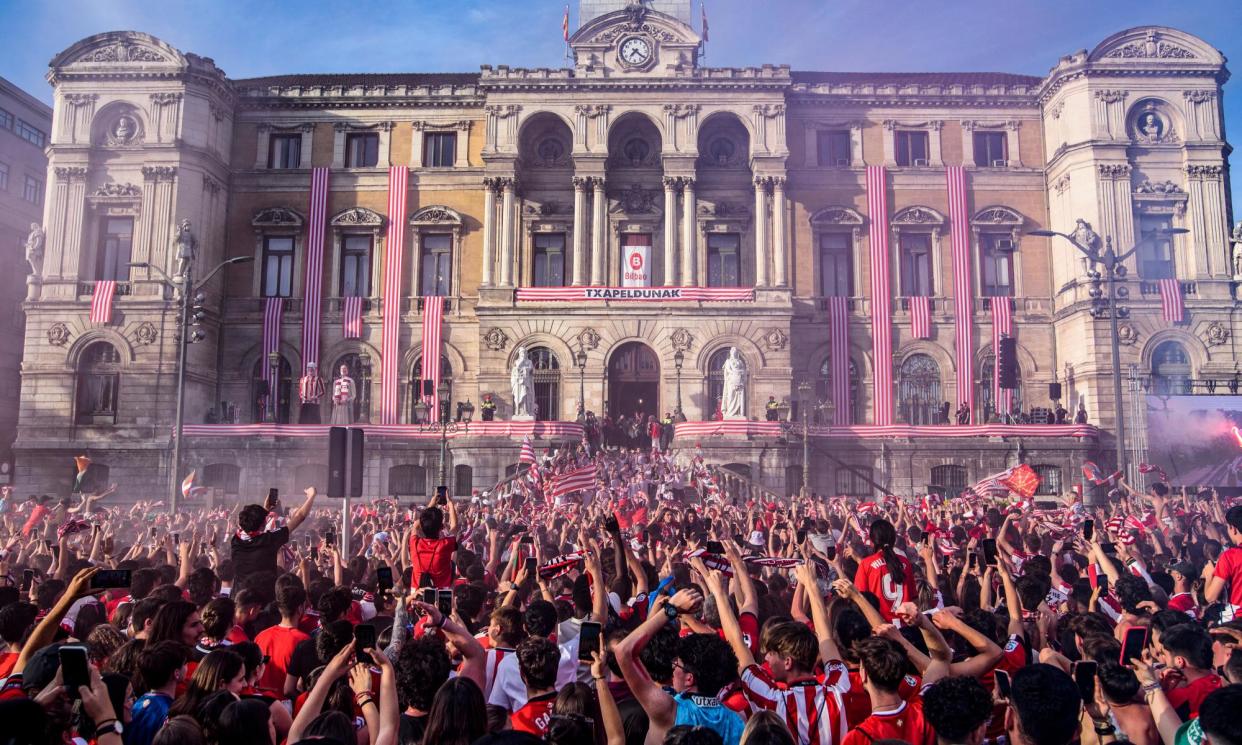 <span>Athletic Club supporters in the Basque city of Bilbao celebrate the club’s momentous Copa del Rey win against Mallorca.</span><span>Photograph: Javier Zorrilla/EPA</span>