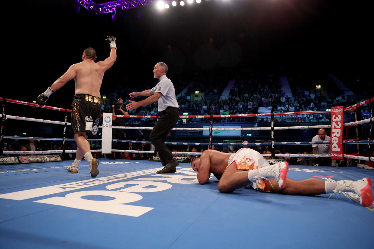 Joe Joyce (right) is knocked down by Zhilei Zhang during the WBO 'Interim' Heavyweight Title match at the OVO Arena Wembley, London. Picture date: Saturday September 23, 2023. (Photo by Steven Paston/PA Images via Getty Images)