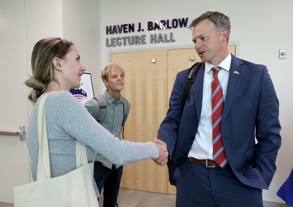 Megan Harris shakes hands with Rep. Blake Moore, R-Utah, after Sutherland Institute’s 2023 Congressional Series at the Olene S. Walker Institute of Politics and Public Service at Weber State University in Ogden on Tuesday, Aug. 29, 2023. | Kristin Murphy, Deseret News