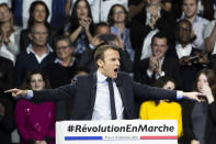 FILE - In this Dec. 10, 2016 file photo, former French Economy Minister gestures as he delivers his speech during a campaign meeting in Paris, France. With a year to go to the presidential vote, French President Emmanuel Macron is getting ready for a potential re-election bid by prioritizing reviving the economy and saving jobs. The country is slowly stepping out of its partial lockdown. Macron’s ability to meet the challenge will be key _ as France is among countries worst hit by the pandemic in the world, with over 105,000 virus-related deathss. (AP Photo/Kamil Zihnioglu, File)