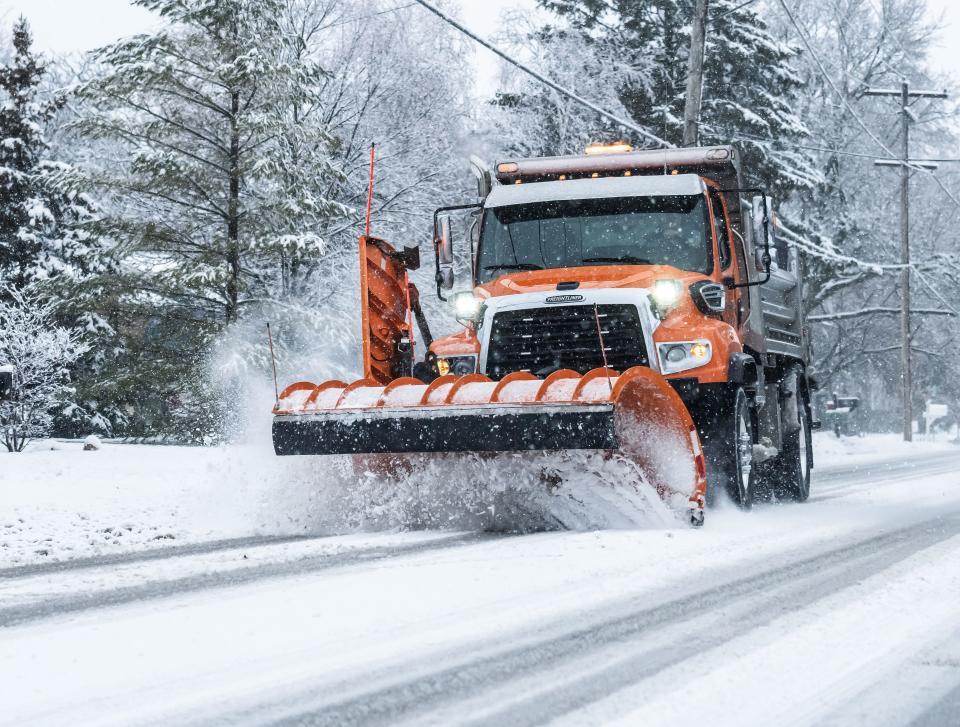 A plow truck clears Merton Avenue in Hartland on Tuesday, Jan. 9, 2024.