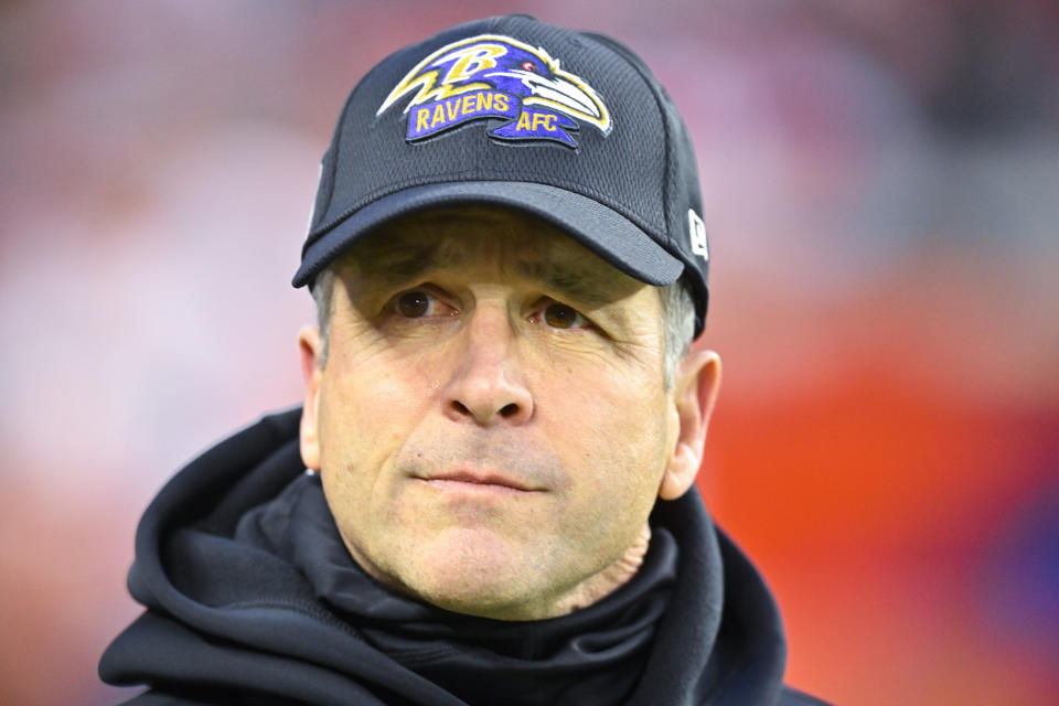 Baltimore Ravens head coach John Harbaugh runs onto the field before an NFL football game against the Cleveland Browns, Saturday, Dec. 17, 2022, in Cleveland. (AP Photo/David Richard)