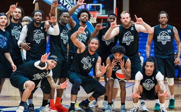 The Indiana Lyons celebrate after knocking the No. 1 seed out of the ABA tournament April 14, 2023. They were set to play the championship game the next day, but it was canceled.