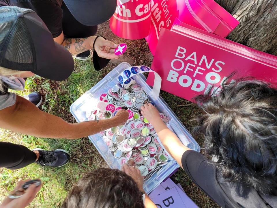 Protesters gathered to voice their opposition to the Supreme Court decision to overturn Roe v. Wade during a Decision Day rally where Planned Parenthood Great Plains provided pins on Friday, June 24, 2022 at Mill Creek Park in Kansas City.